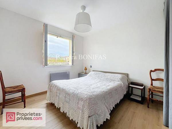 Maison plain pied  5 pièces 114 m2, double garage et jardin