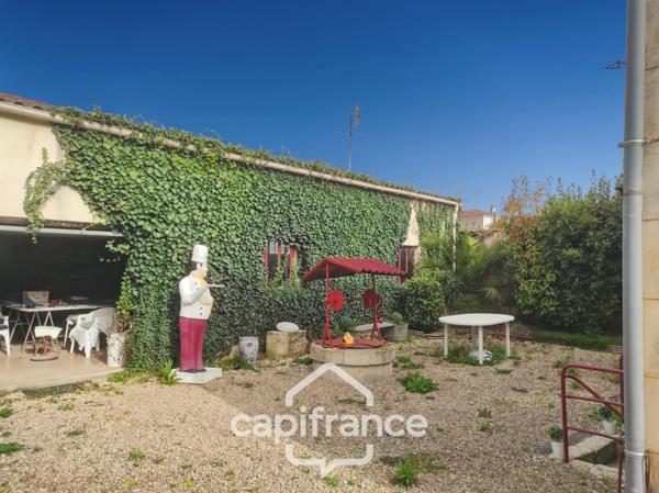 Maison de plain pied à vendre 3 pièces SAINT JEAN D'ANGELY (17) avec jardin et garage, proche commerces