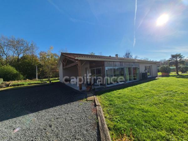 A Migron Maison confortable de 125m² et sa véranda de 21m²