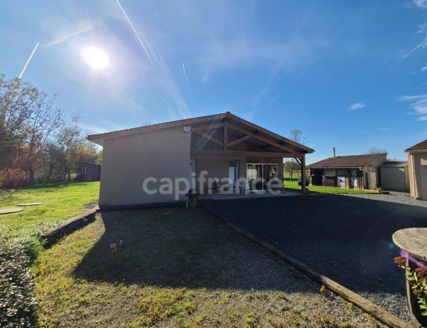 A Migron Maison confortable de 125m² et sa véranda de 21m²