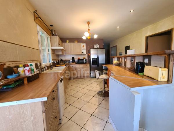 A Migron Maison confortable de 125m² et sa véranda de 21m²