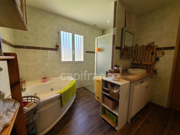 A Migron Maison confortable de 125m² et sa véranda de 21m²