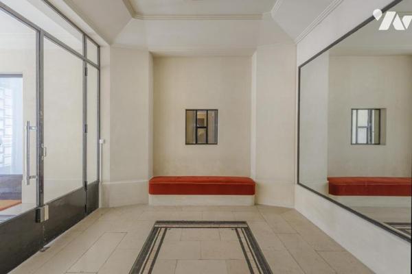 Appartement-deux caves-parking Paris 17