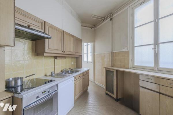 Appartement-deux caves-parking Paris 17