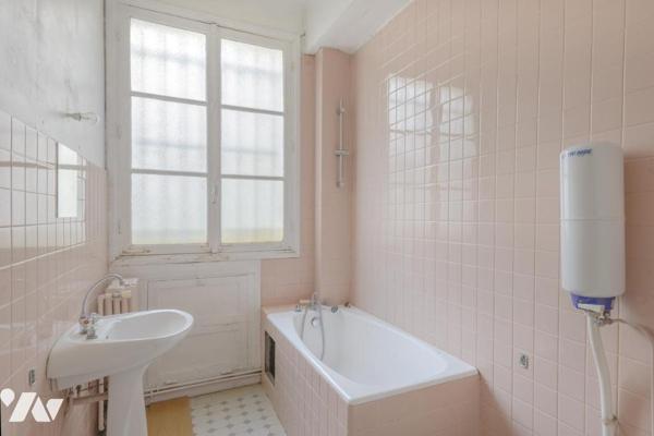 Appartement-deux caves-parking Paris 17