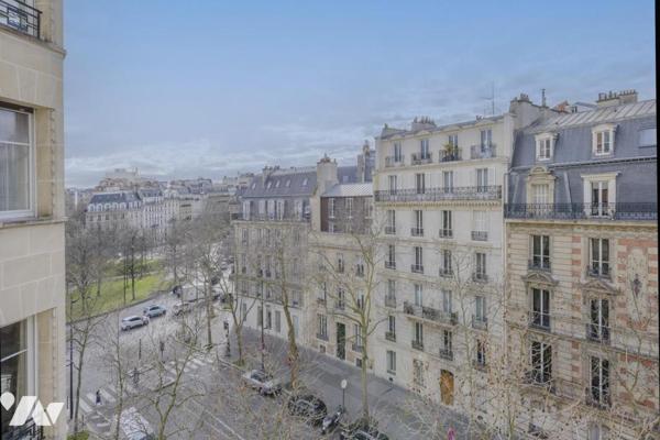 Appartement-deux caves-parking Paris 17
