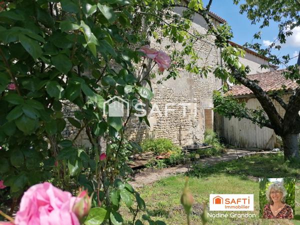 Maison familiale, non mitoyenne avec Granges attenantes et jardin clos