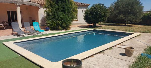 GARD. 30. GENERAC. Belle maison de 184 m2 de plain-pied sur terrain arboré de 1264 m² avec piscine