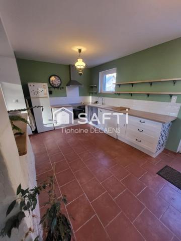 maison avec sous sol intégral, grande pièce de vie cuisine ouverte, dépendance et garage