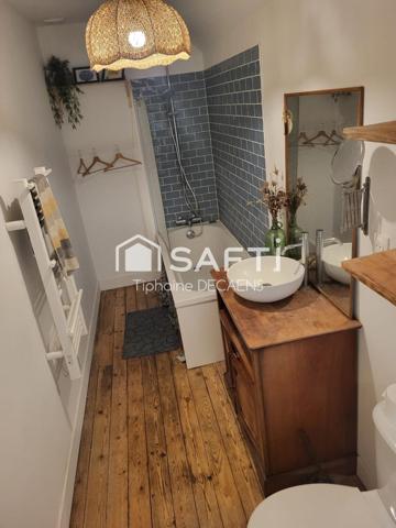 maison avec sous sol intégral, grande pièce de vie cuisine ouverte, dépendance et garage