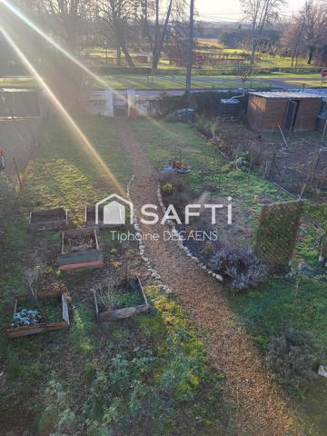 maison avec sous sol intégral, grande pièce de vie cuisine ouverte, dépendance et garage