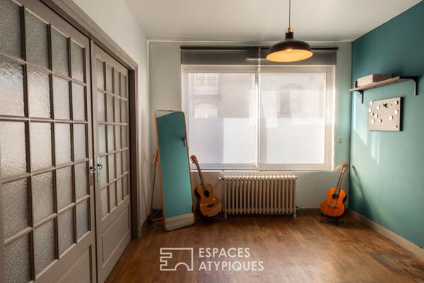 Esprit maison de ville : duplex atypique avec jardin partagé