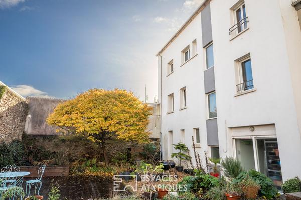 Esprit maison de ville : duplex atypique avec jardin partagé