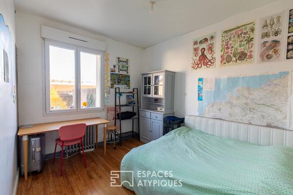 Esprit maison de ville : duplex atypique avec jardin partagé