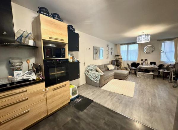 Appartement 3 pièces 70m2 avec cave et place de parking box