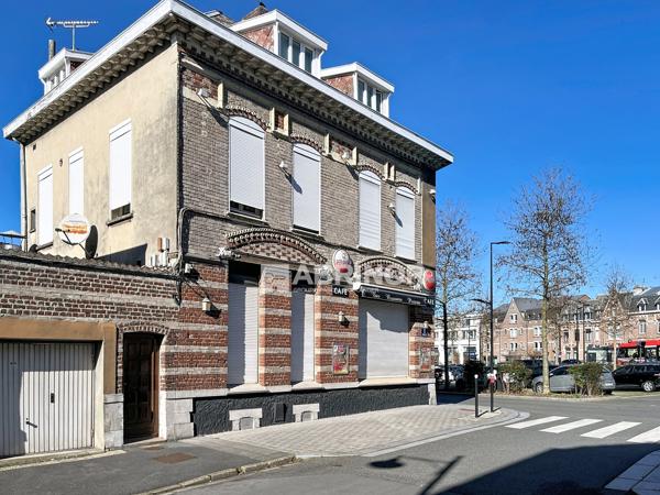 IMMEUBLE DE RAPPORT AVEC COMMERCE ET GARAGE PROCHE CENTRE ET TRANSPORTS VALENCIENNES