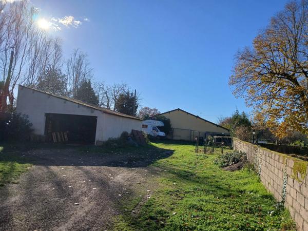 GRANDE MAISON AVEC SES 5 CHAMBRES ET SON JOLI TERRAIN