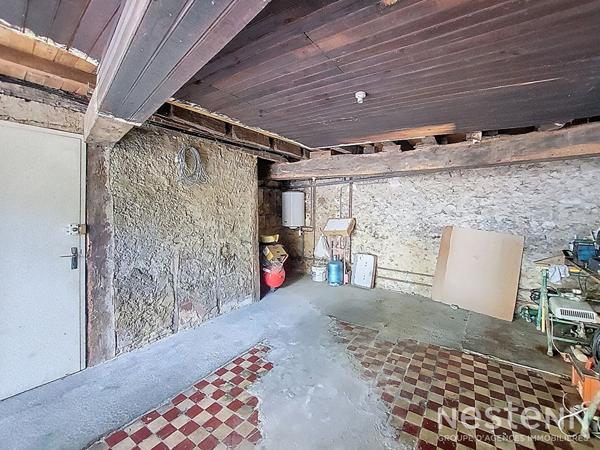 A Vendre Immeuble en pierre à rénover sur deux étages avec garage au coeur de Condom