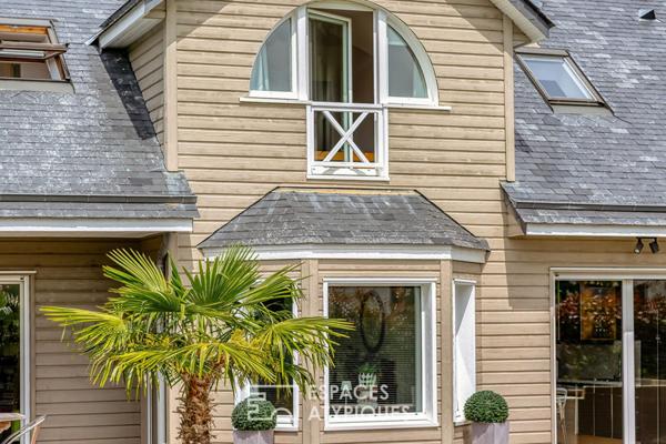Maison d’architecte avec dépendance dans un parc
