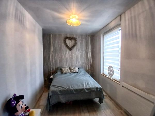 Maison semi-individuelle avec garage