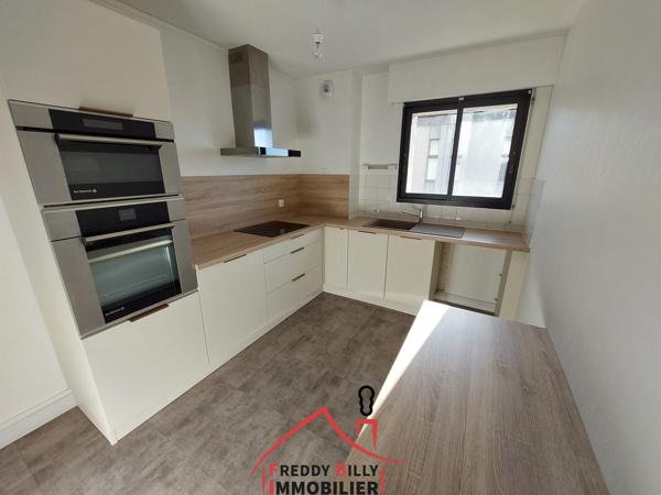 Appartement T3 - Centre ville, 2 chambres, balcon, cave et place de parking en sous-sol