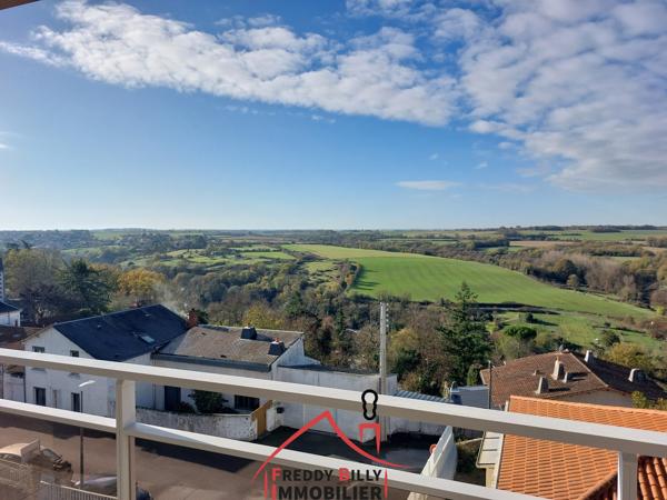 Appartement T3 - Centre ville, 2 chambres, balcon, cave et place de parking en sous-sol