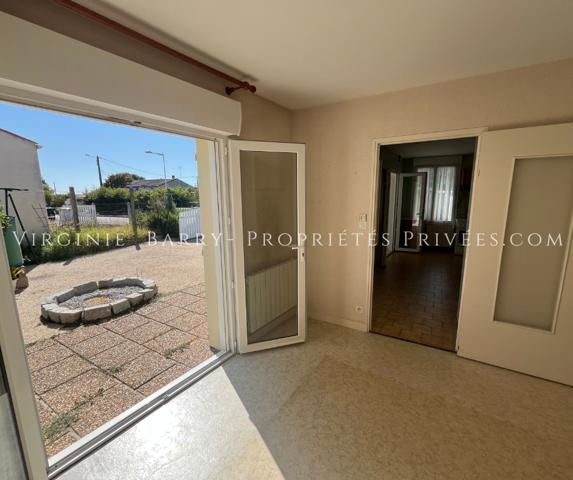 MAISON DE PLAIN PIED AVEC VERANDA ET EXTERIEUR