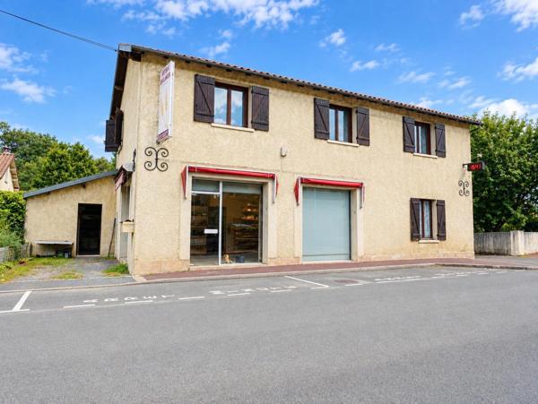 Maison avec ancienne boulangerie, 4 chambres, jardin clos et nombreux stationnements