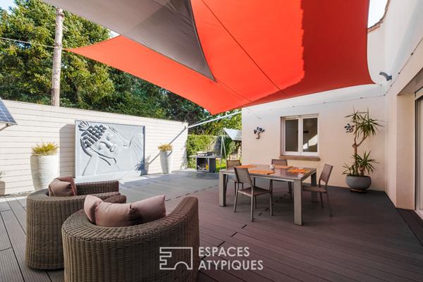 Maison moderne de plain-pied au cadre verdoyant