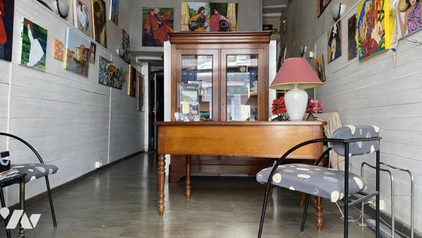 Immeuble entier composé de 5 appartements + 1 local professionnel + local technique + greniers dans 