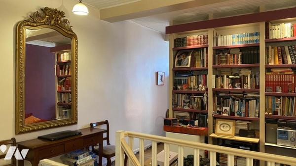 Immeuble entier composé de 5 appartements + 1 local professionnel + local technique + greniers dans 