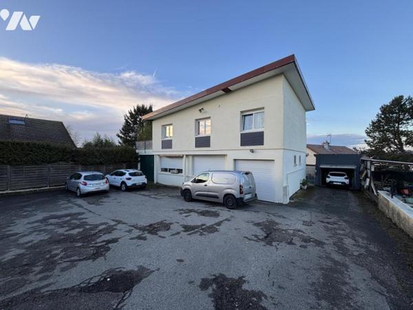 Maison 4 pièces (environ 90 m²) avec vaste atelier au Rdc et située dans un secteur calme et prisé