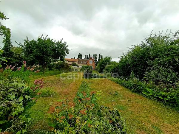 Maison 1920 avec jardin et beau potentiel – Croisilles