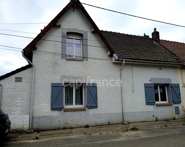 Maison 1920 avec jardin et beau potentiel – Croisilles