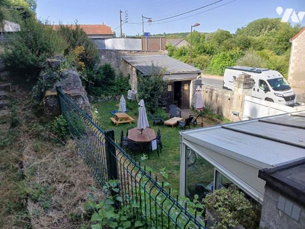 Maison d'habitation avec garage et jardin proche centre