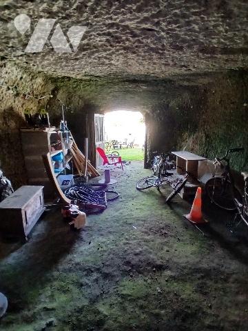 Maison d'habitation avec garage et jardin proche centre