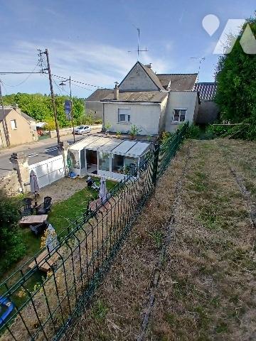 Maison d'habitation avec garage et jardin proche centre