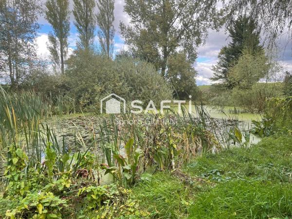 Terrain de loisirs 10323m² avec étang