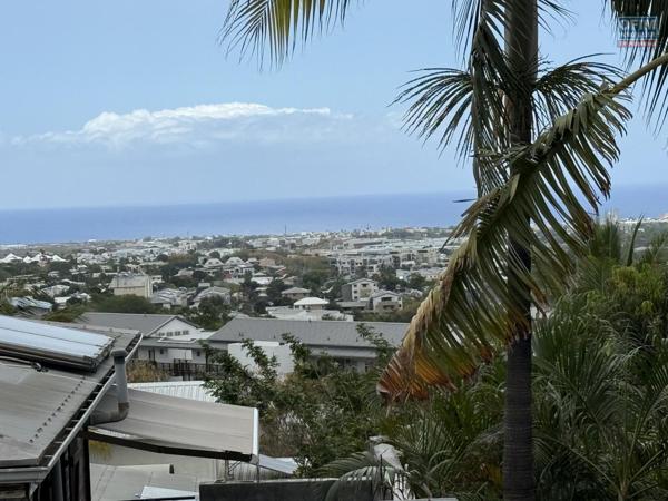 À vendre à La Possession Appartement F3/F4 en rez-de- jardin avec vue mer