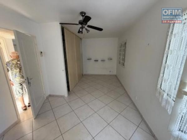 À vendre à La Possession Appartement F3/F4 en rez-de- jardin avec vue mer