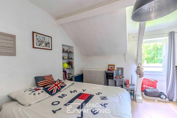 Maison familiale en pierre, terrasses, écrin de verdure à deux pas de Nantes