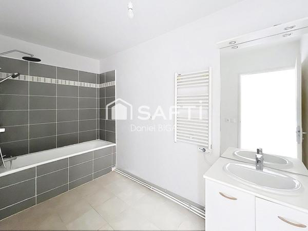 Appartement  T3 de 2014 avec place de parking couverte