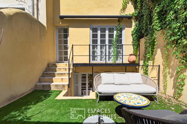 Rez de jardin intimiste avec dépendance au coeur du quartier Mazarin