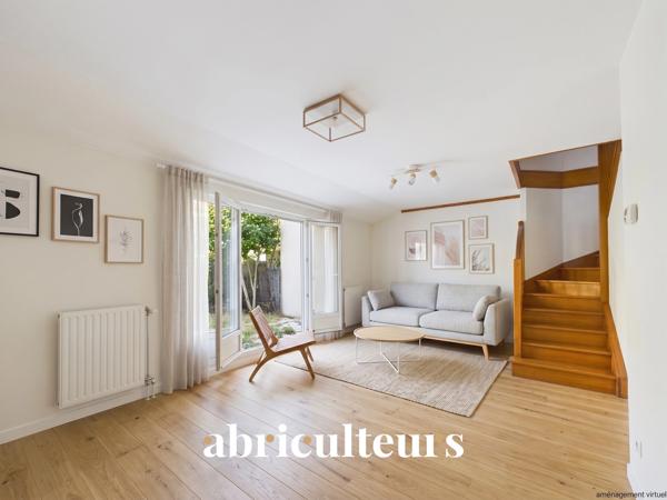 À Gennevilliers, maison familiale avec jardin, terrasse, garage et 4 chambres, à proximité du RER C et du tram T1.