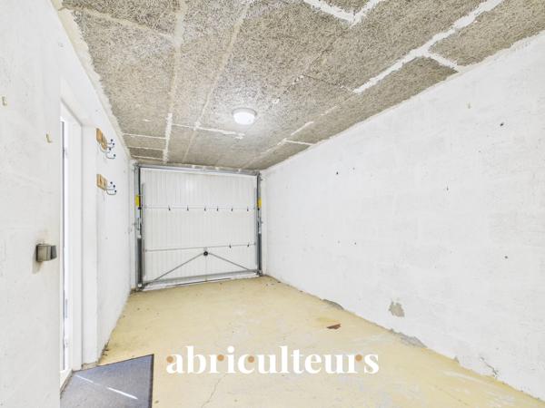 À Gennevilliers, maison familiale avec jardin, terrasse, garage et 4 chambres, à proximité du RER C et du tram T1.
