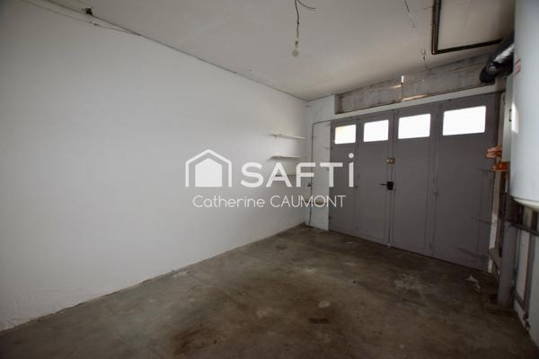 Au centre de Lacrouzette maison/garage/cour