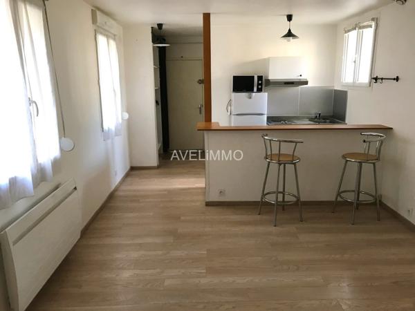 Immeuble divisé en 4 studios avec caves et garages