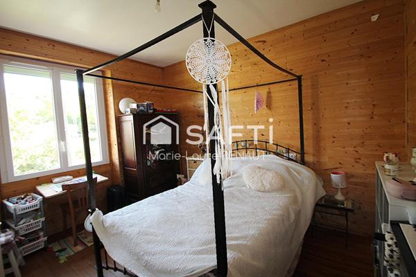 Maison avec sous-sol – 5 chambres – Garage – 1 000m² terrain