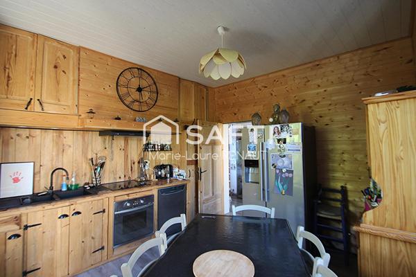 Maison avec sous-sol – 5 chambres – Garage – 1 000m² terrain