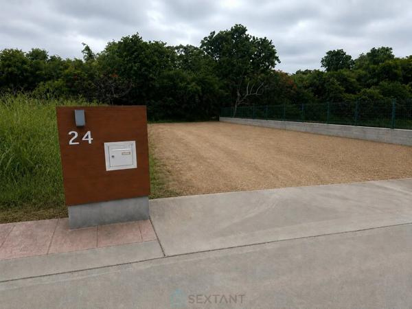 Terrain constructible de 1 051 m² dans un lotissement privé à Saint-François